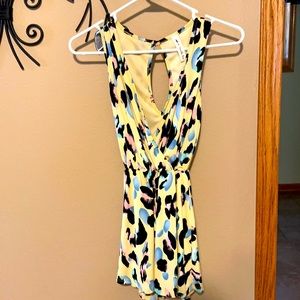 Multicolor Romper, deep v neck and keyhole back only worn one time
